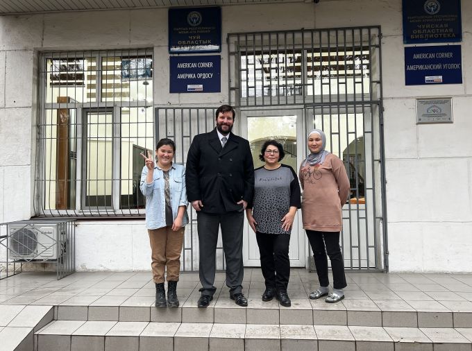 Floyd and the coordinators at the American Corner in Kant, Kyrgyz Republic.