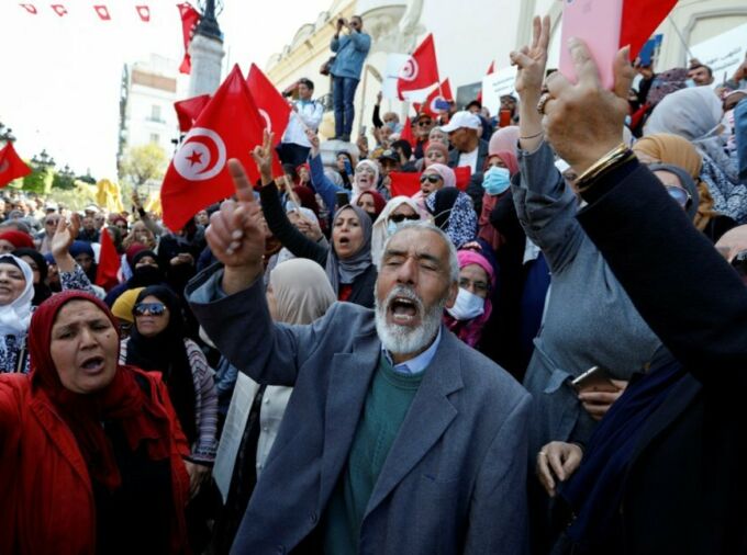 Crowd of people protesting in Tunisia